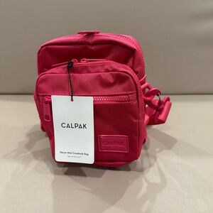 CALPAK Stevyn Mini Crossbody Bag Purse
Dragon Fruit NWT